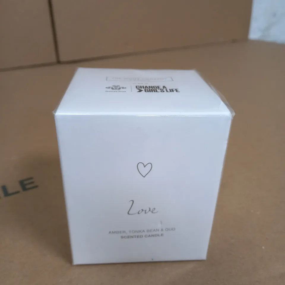 BOXED AND SEALED LOVE AMBER , TONKA BEAN AND OUD SCENTED CANDLE 