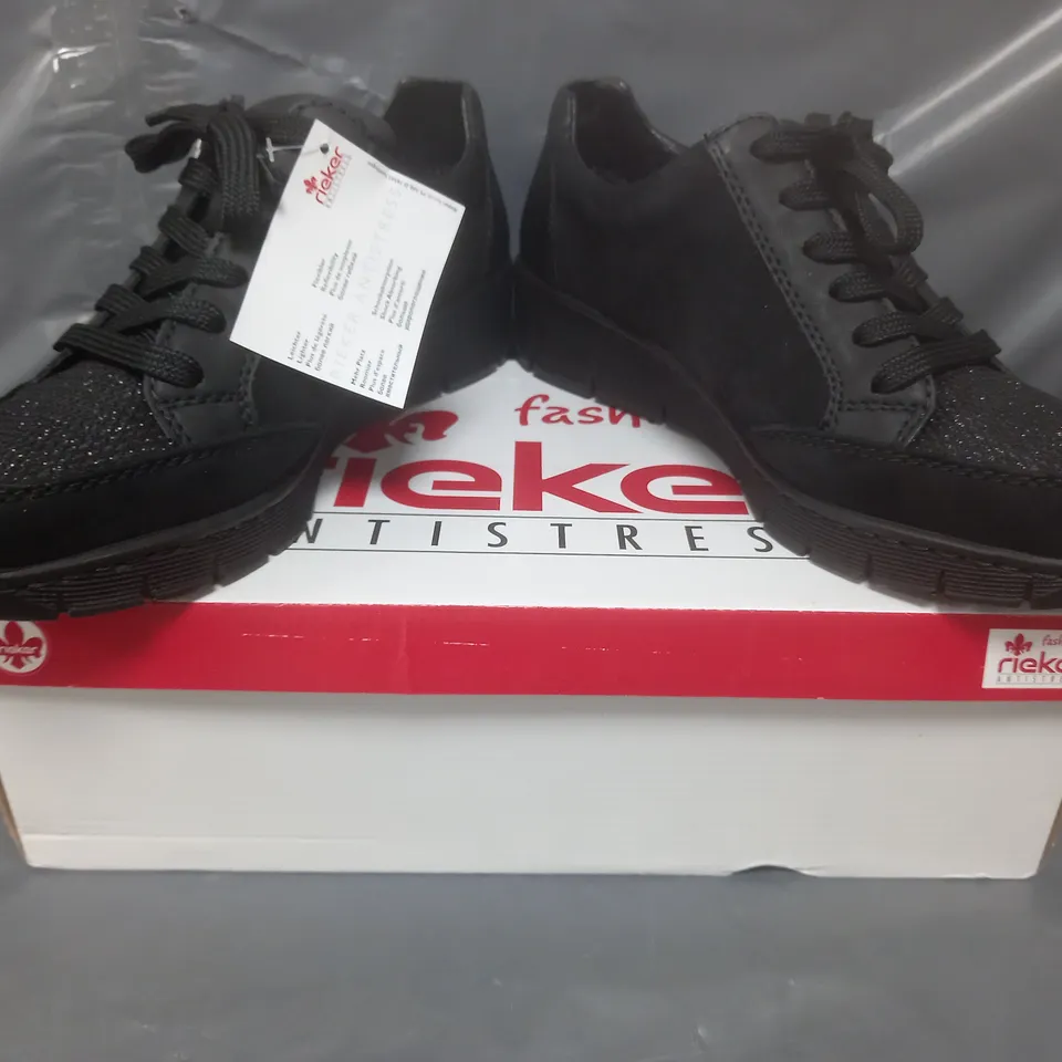 BOXED PAIR OF RIEKER WEDGE TRAINERS IN BLACK SIZE 6