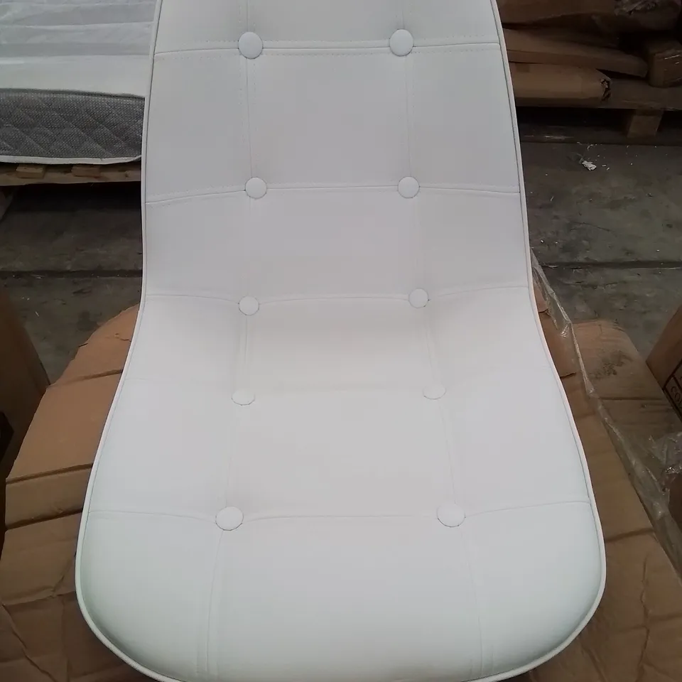 A BOXED WHITE BUTTON BACK SWIVEL OFFICE CHAIR