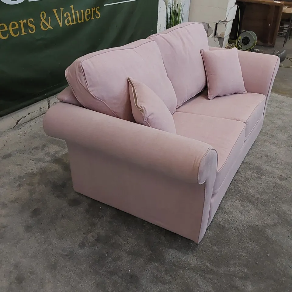 THE LANGRIDGE 2 SEATER SOFA BED IN UPHOLSTERED PINK FABRIC