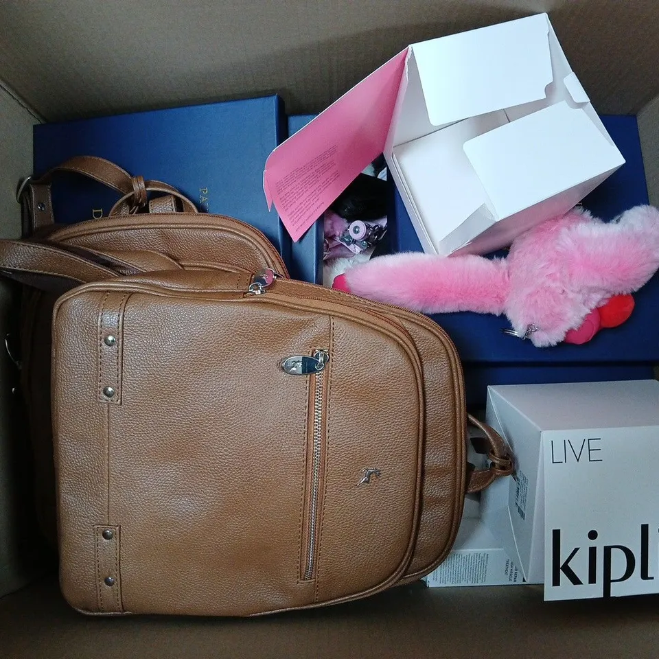 APPROXIMATELY 12 ASSORTED HOUSEHOLD GOODS TO INCLUDE FLUFFY PONCHO, KIPLING PURSES, AND PAUL COSTELLOE DRESSAGES ETC. 
