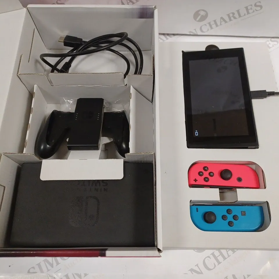 BOXED NINTENDO SWITCH WITH CONTROLLERS AND ACCESSORIES