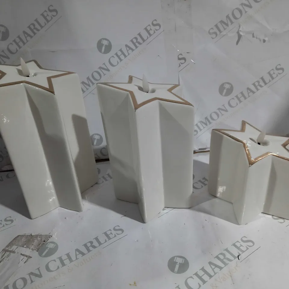 BOXED SET OF 3 PRE-LIT WHITE STAR CANDLES 