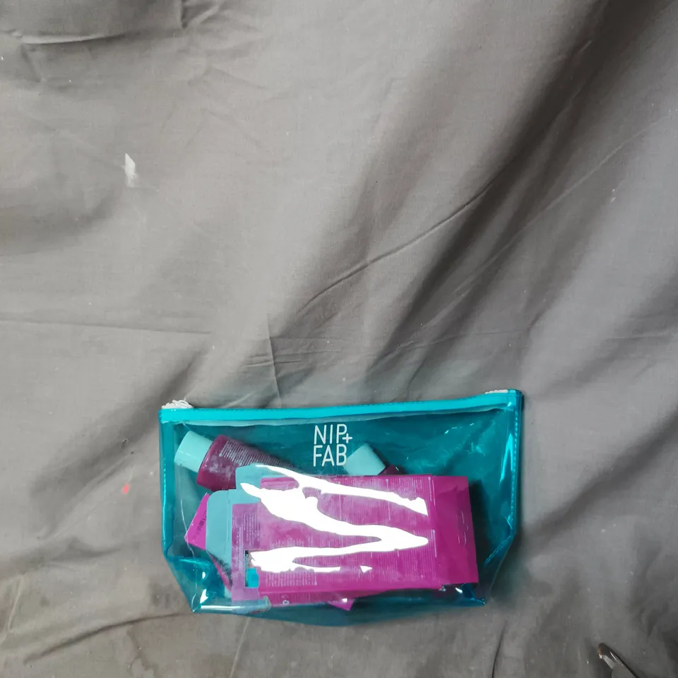 NIP+FAB SKINCARE SET IN TEAL ZIP POUCH