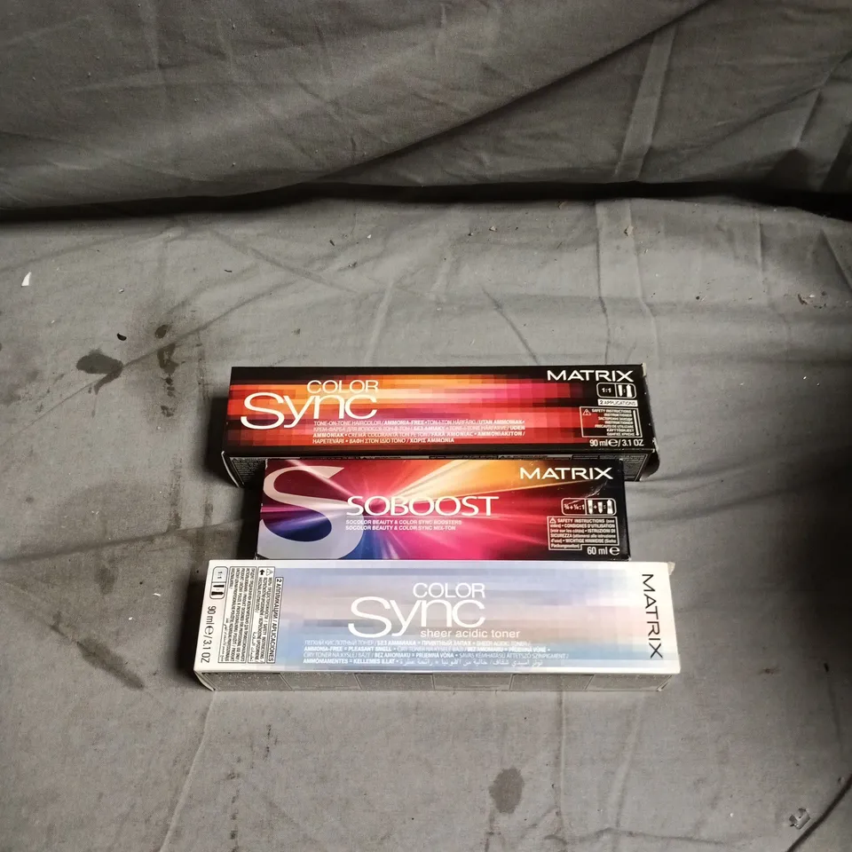 BOX OF APPROXIMATELY 60 MATRIX HAIR CARE PRODUCTS INCLUDING COLOR SYNC VIOLET, BRUNETTE MOCHA/MATTE/ASH/NEUTRAL, MAGENTA AND SOBOOST YELLOW