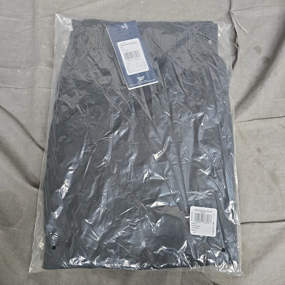 BAGGED REEBOK ID-TRAIN WOVEN OPEN HEM PANT – BLACK, SIZE L