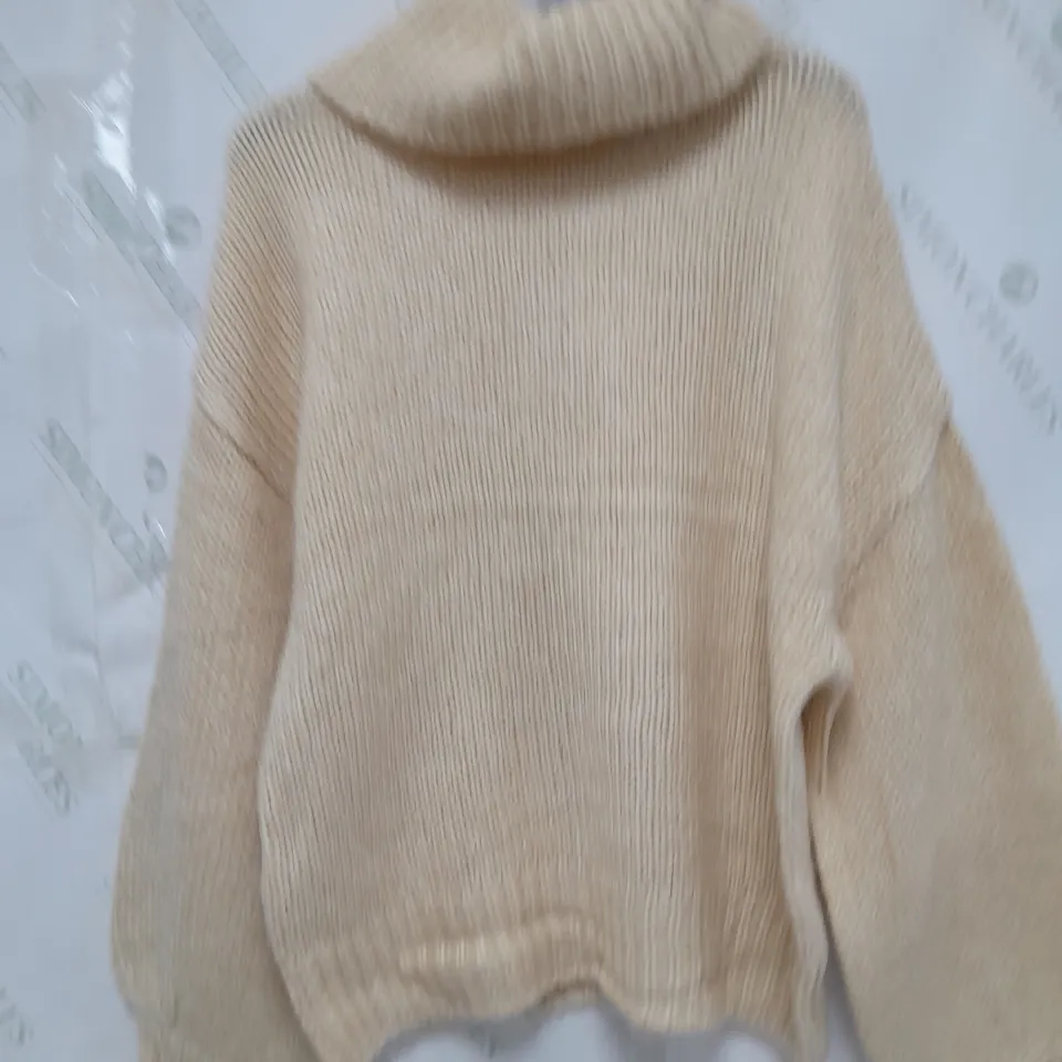 PALLET OF APPROXIMATELY 25 BOXES OF ASSORTED CLOTHING TO INCLUDE LONG SLEEVE SCOOP TOP & ROLL NECK PULLOVER,ETC - COLLECTION ONLY 