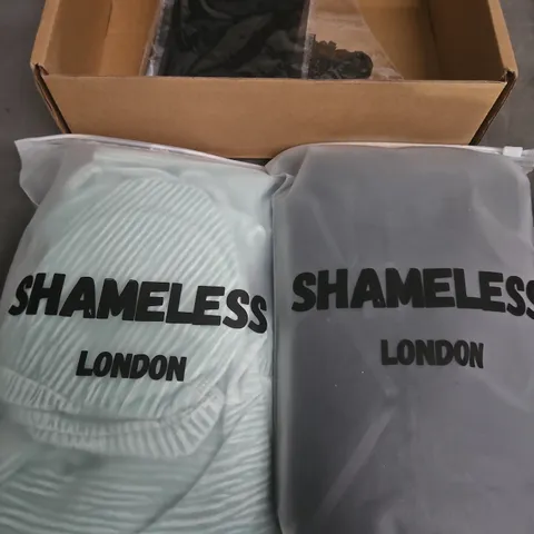 Shameless London clothing – two items in bags