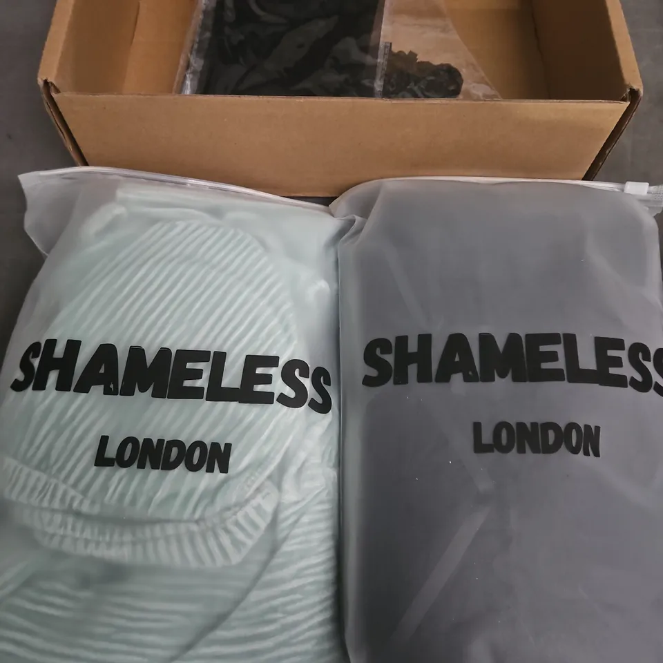 Shameless London clothing – two items in bags