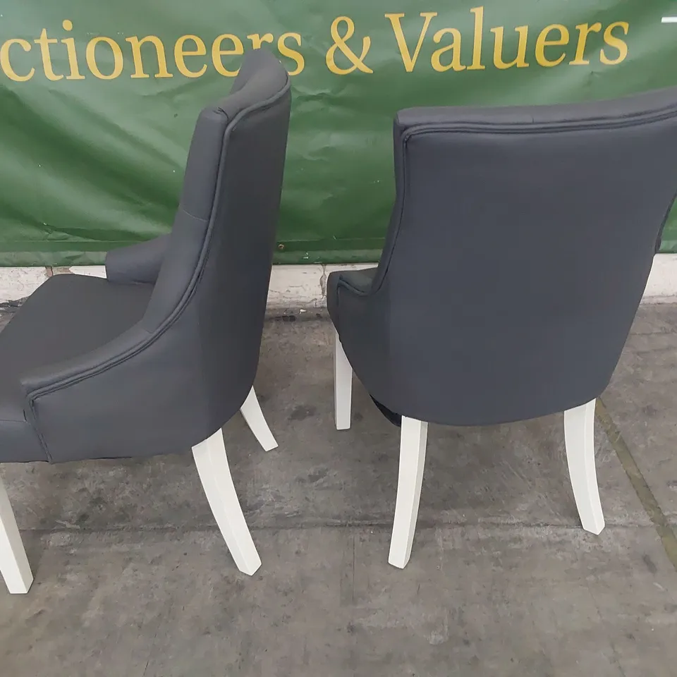 PAIR OF UPHOLSTERED BUTTONED BACK DINING CHAIRS GREY PU ON WHITE PAINTED LEGS 