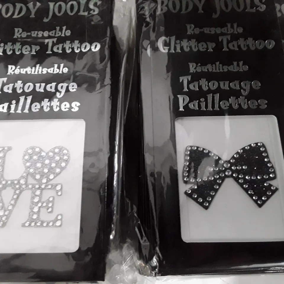 LOT OF APPROXIMATELY 200 PACKS OF BODY JOOLS LOVE AND BOW REUSABLE GLITTER TATTOOS 