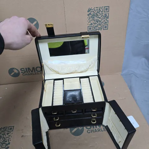 BLACK LEATHERETTE JEWELLERY BOX WITH RING CUSHIONS, INTERIOR MIRROR AND FEMME WITHIN CARD