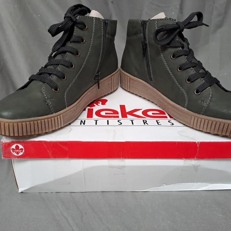 BOXED PAIR OF RIEKER HIGH TOP CUFFED TRAINERS IN KHAKI SIZE 6