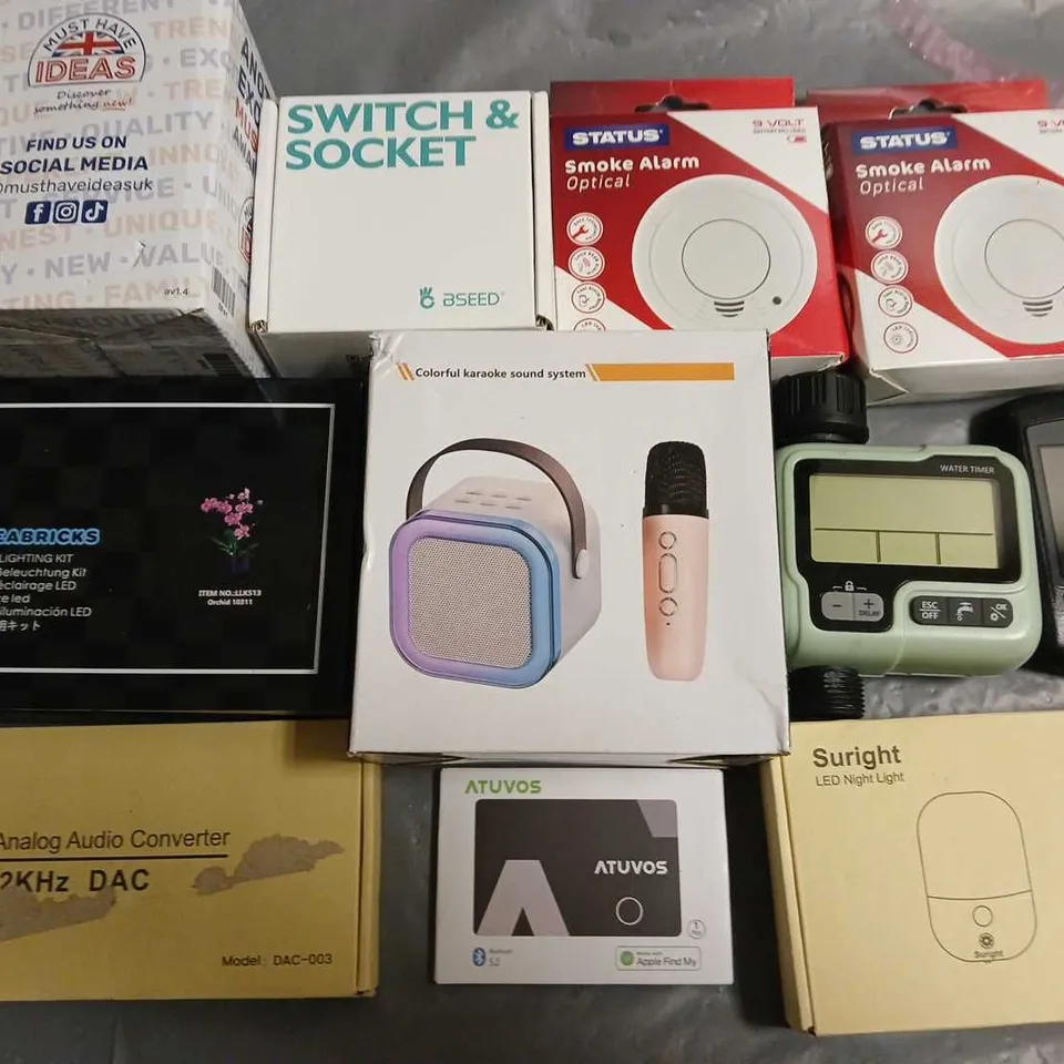 LOT OF APPROXIMATELY 16 ASSORTED HOUSEHOLD ITEMS TO INCLUDE OPTICAL SMOKE ALARMS, BSEED SWITCH & SOCKET AND KAROKE SOUND SYSTEM