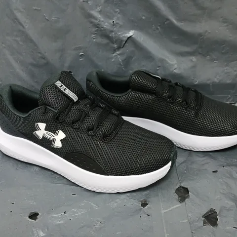 BOXED PAIR OF UNDER ARMOUR RUNNING CHARGED SURGE 4 TRAINERS - SIZE 12 