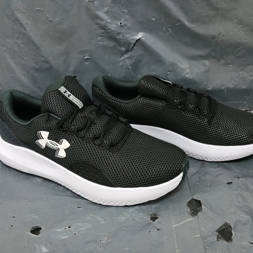 BOXED PAIR OF UNDER ARMOUR RUNNING CHARGED SURGE 4 TRAINERS - SIZE 12 