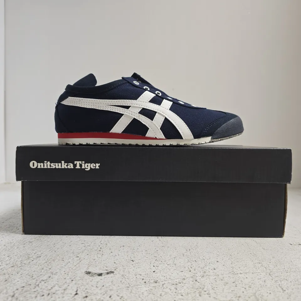 BOXED PAIR OF ONITSUKA TIGER TRAINERS IN NAVY/WHITE SIZE 3.5