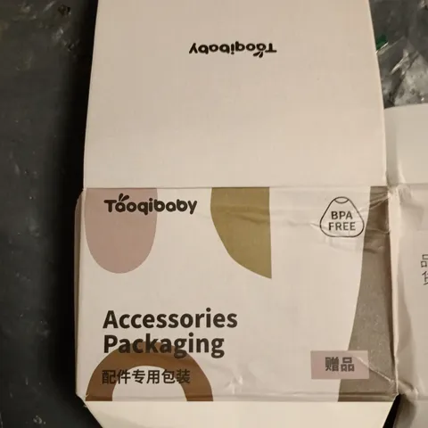 BOX OF APPROXIMATELY 130 BABY BOTTLE TOPS 