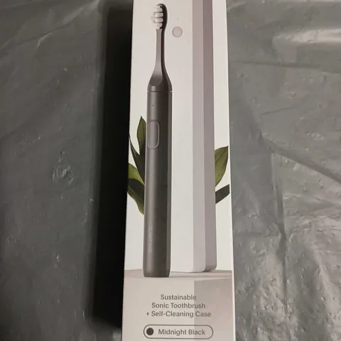 SEALED SURI SONIC TOOTHBRUSH IN MIDNIGHT BLACK