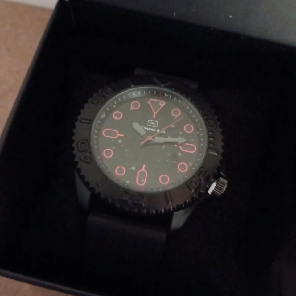 ZIHLMANN & CO STAINLESS STEEL WATCH WITH BLACK DIAL & BLACK RUBBER STRAP