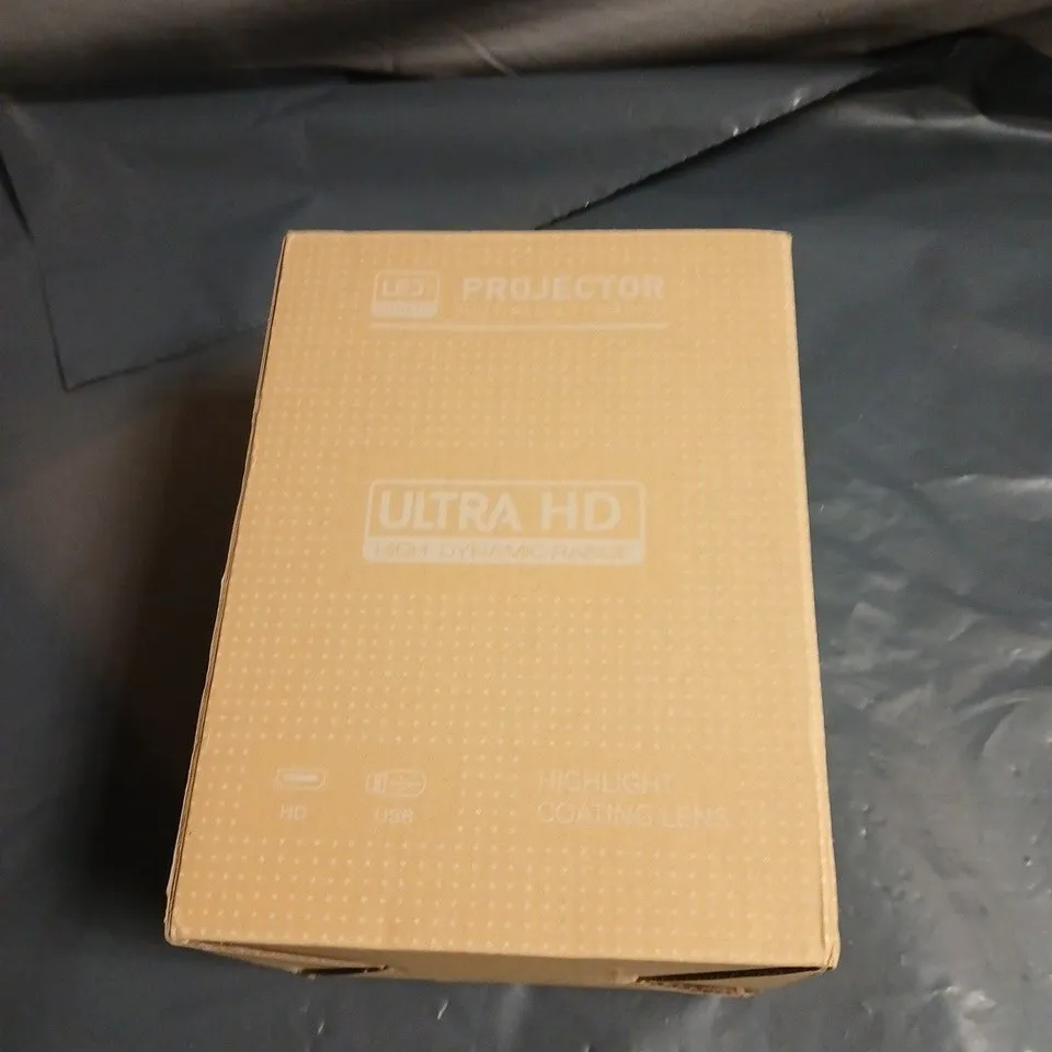 LED PORTABLE PROJECTOR – ULTRA HD, WHITE CYLINDER 