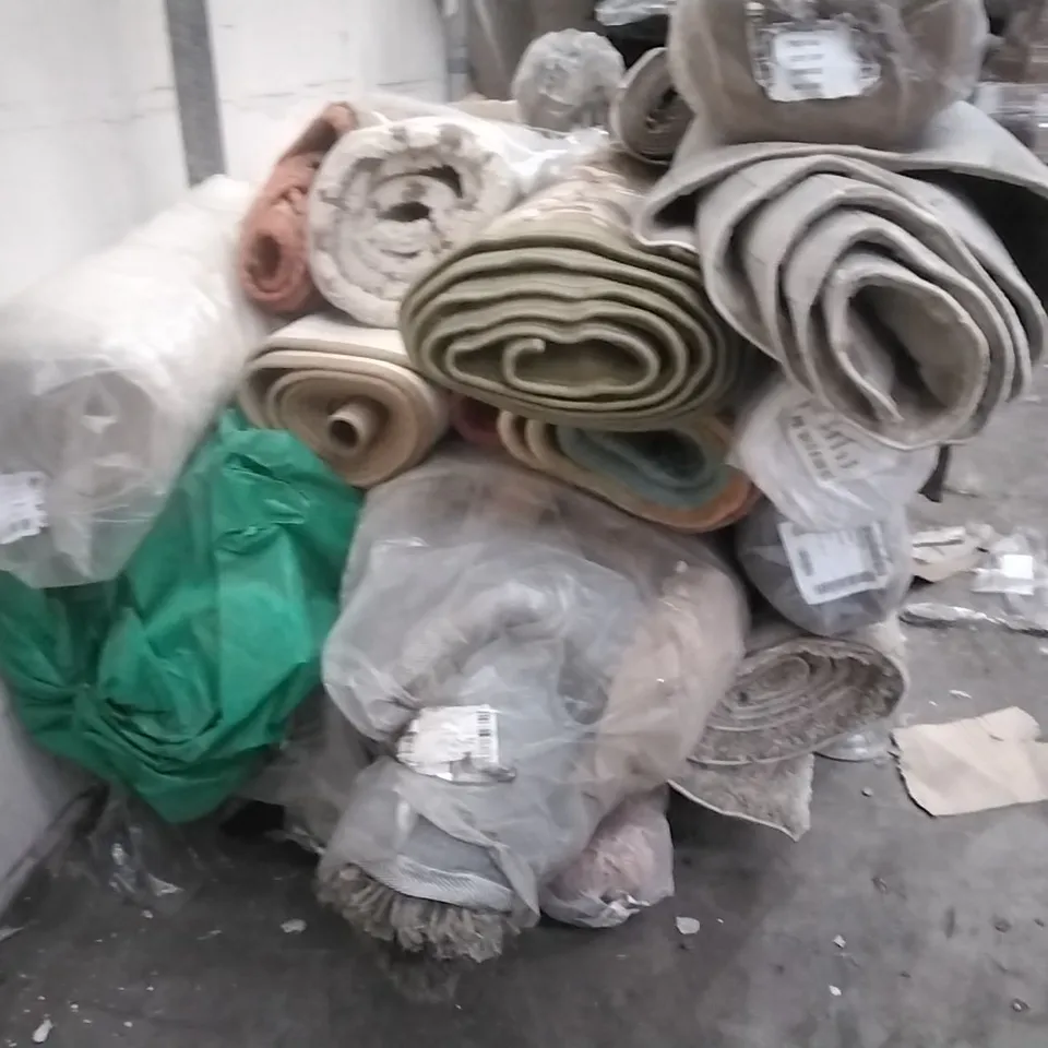 STILLAGE OF APPROXIMATELY 20 DESIGNER RUGS