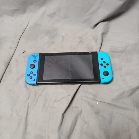 NINTENDO SWITCH CONSOLE WITH NEON BLUE JOY-CON CONTROLLERS