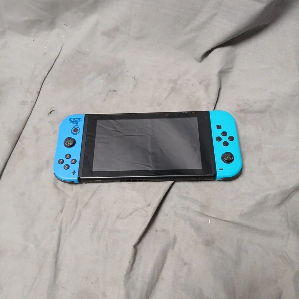 NINTENDO SWITCH CONSOLE WITH NEON BLUE JOY-CON CONTROLLERS