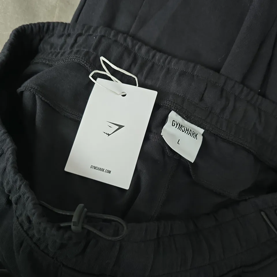GYMSHARK INTERLOCK TECH JOGGERS IN BLACK - LARGE
