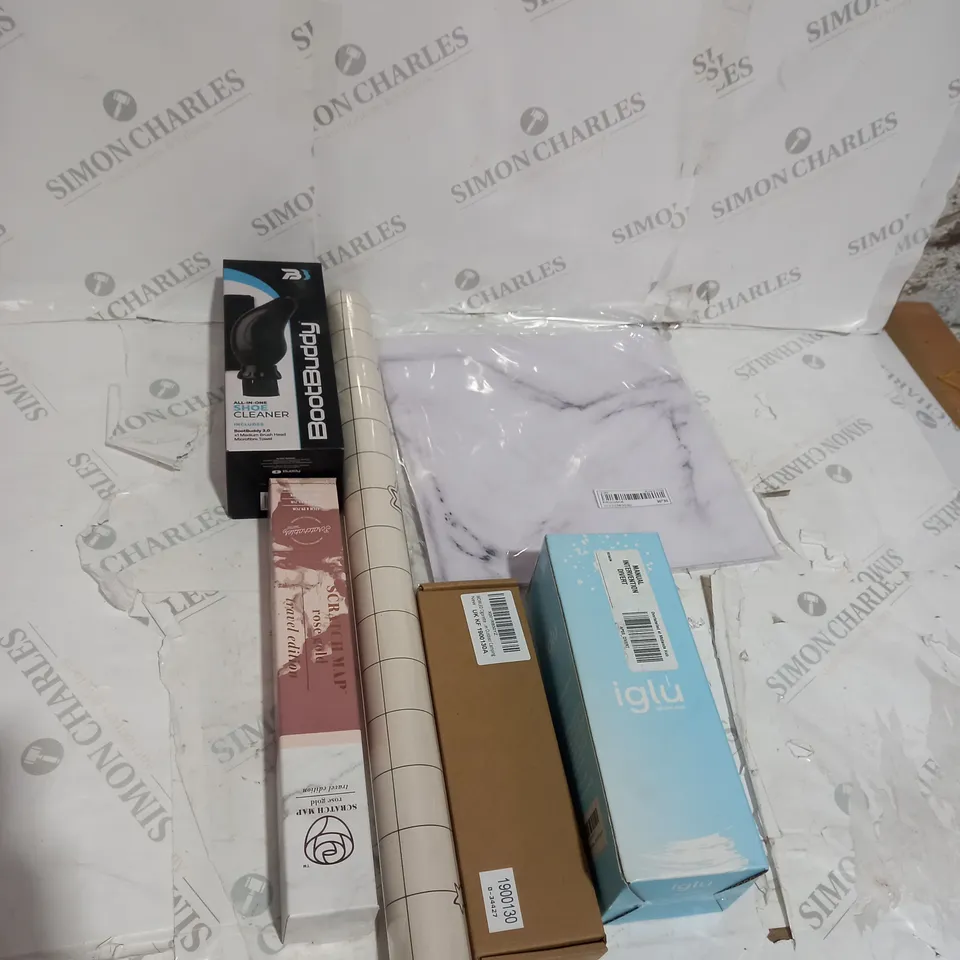 TOTE OF APPROXIMATELY 15 ASSORTED HOUSEHOLD  ITEMS TOO INCLUDE BOTTLES , SHOE CLEANERS , WALLPAPER , ETC 