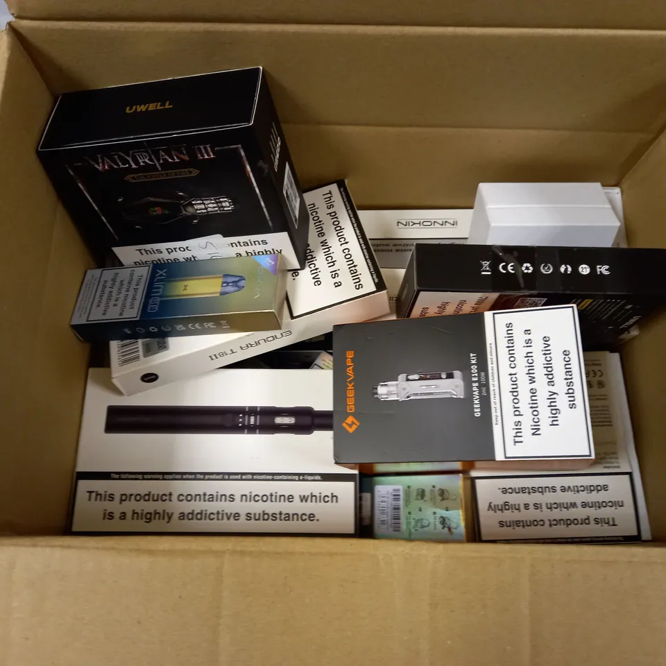 BOX OF APPROXMATELY 28 E-CIGARETTES AND LIQUIDS TO INCLUDE VALYRAN III KIT, OOXYA XLIM SE, CALIBURN A2 POD SYSTEM, ETC