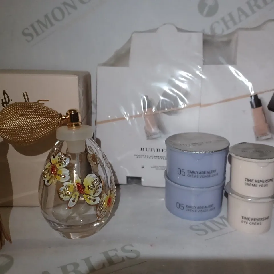 LOT OF APPROX 20 ASSORTED BEAUTY PRODUCTS TO INCLUDE M. MICALLEF CRYSTAL HAND PAINTED SWAROVSKI STONE EMPTY BOTTLES, BURBERRY FOUNDATION POUCHES, MY BLEND EARLY AGE ALERT CREAM, ETC