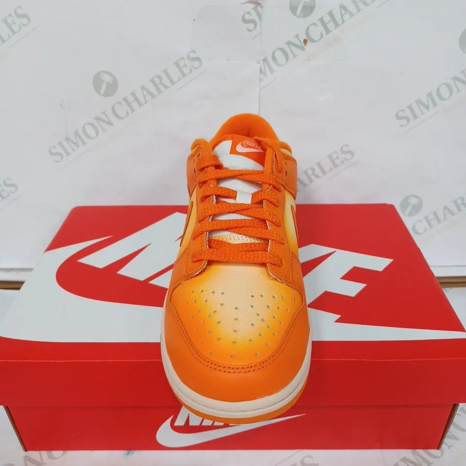BOXED PAIR OF NIKE WOMEN'S DUNK LOW TRAINERS - WHITE & ORANGE / SIZE: 7 UK 