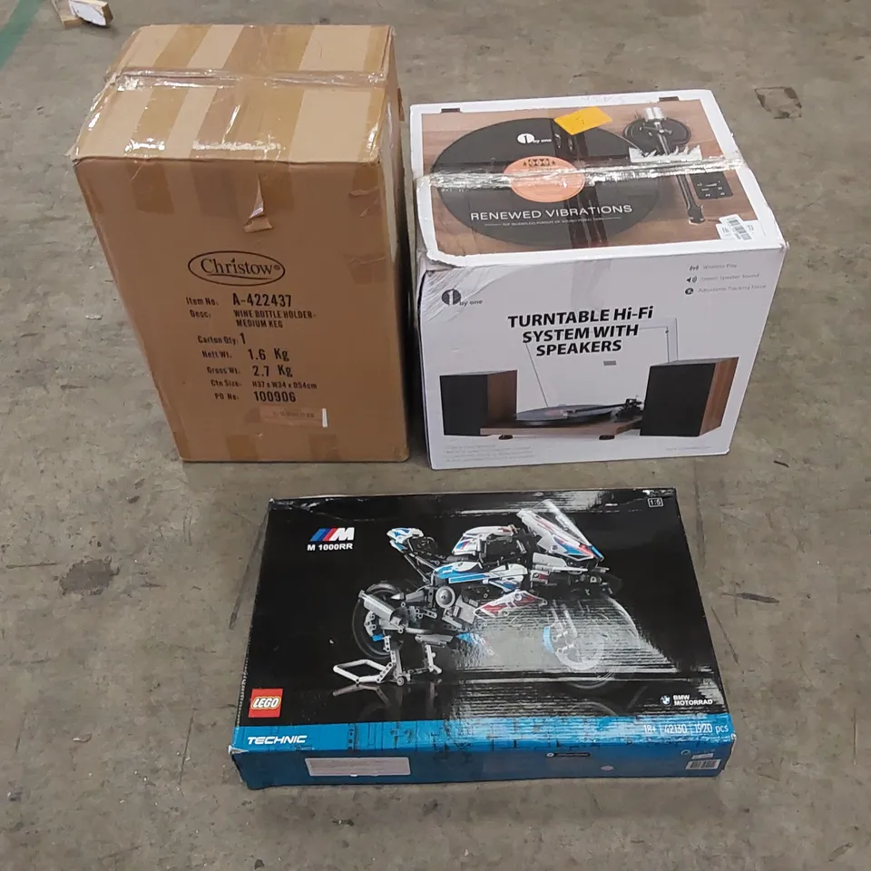 PALLET TO CONTAIN ASSORTED HOUSEHOLD ITEMS AND CONSUMER PRODUCTS. INCLUDING HEATERS, LEGO, WINE BOTTLE HOLDER, TURNTABLE SYSTEM ETC 