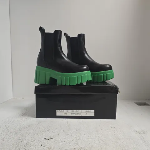 BOXED PAIR OF UNBRANDED CHUNKY PLATFORM ANKLE BOOTS IN BLACK/GREEN SIZE 3