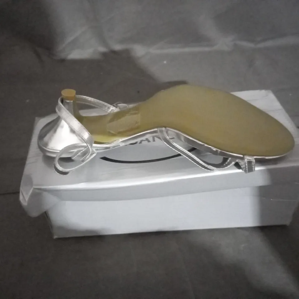APPROXIMATELY 10 BOXED PAIRS OF CASANDRA SILVER SANDALS IN VARIOUS SIZES TO INCLUDE SIZE 5 