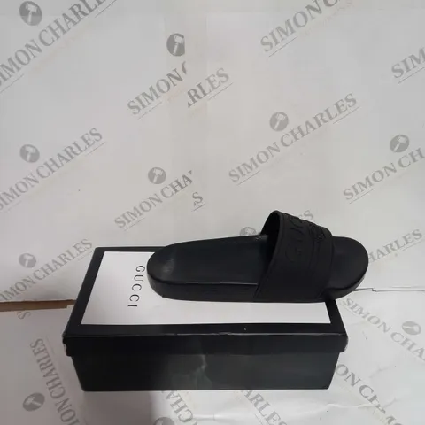 BOXED PAIR OF GUCCI BLACK SLIDES SIZE 44
