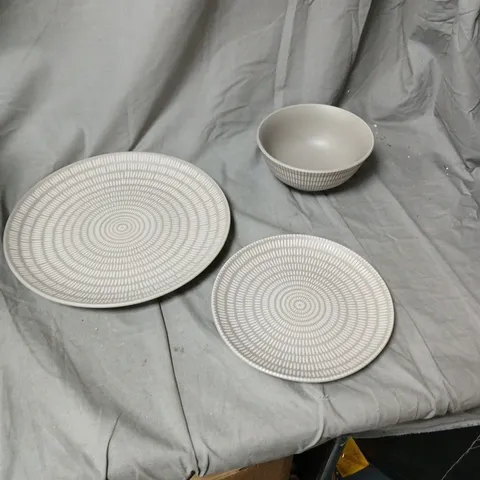 APPROXIMATELY 12 PC  CERAMIC DINNERWARE SET  WITH TEXTURED CONCENTRIC PATTERN 