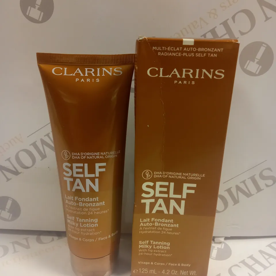 BOXED CLARINS SELF TANNING MILKY LOTION 125ML