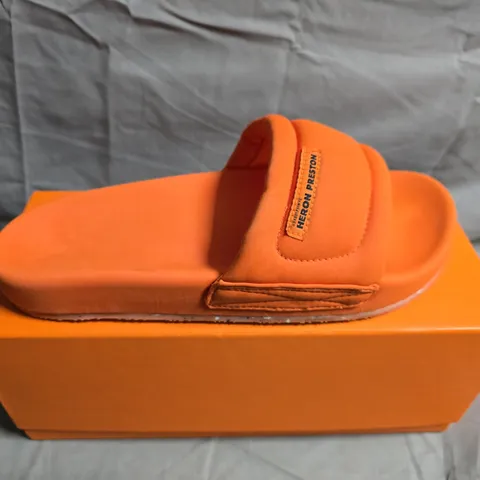 BOXED PAIR OF HERON PRESTON ORANGE FABRIC SLIDES – SIZE 39 EU
