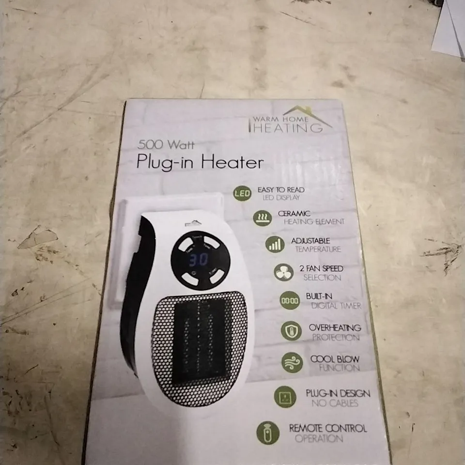 WARM HOME CERAMIC PLUG IN HEATER