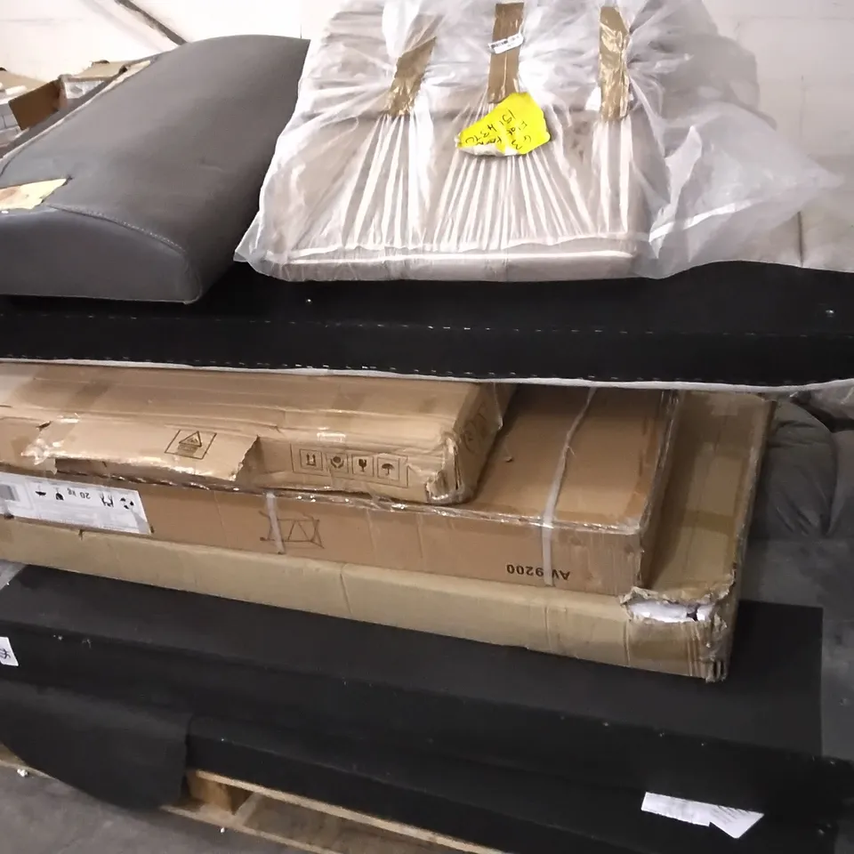 PALLET OF ASSORTED FURNITURE PARTS INCLUDING FOLDING DESK, BED HEADBOARDS AND COUCH PARTS