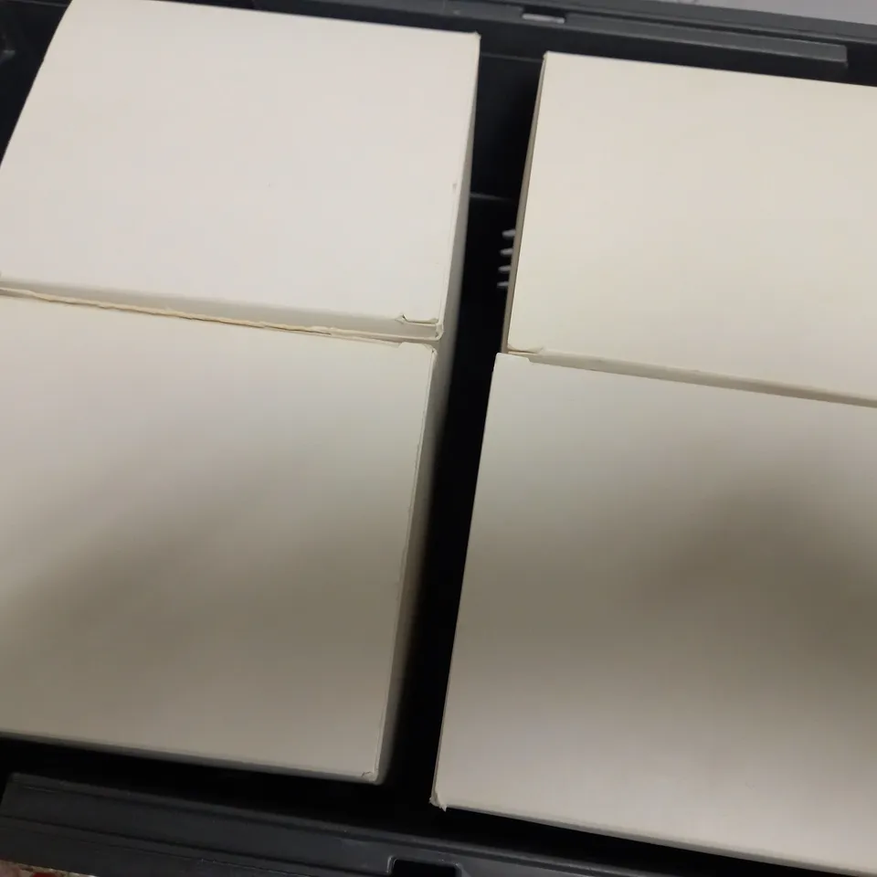 APPROXIMATELY 4 BOXED DOLCE & GABBANA WHITE EMPTY VANITY CASE 