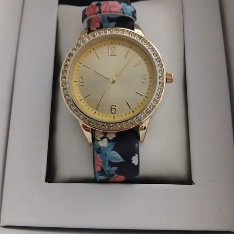 KINGSTOWN GOLD-TONE LADIES WRISTWATCH WITH CRYSTAL-SET BEZEL AND FLORAL FABRIC STRAP