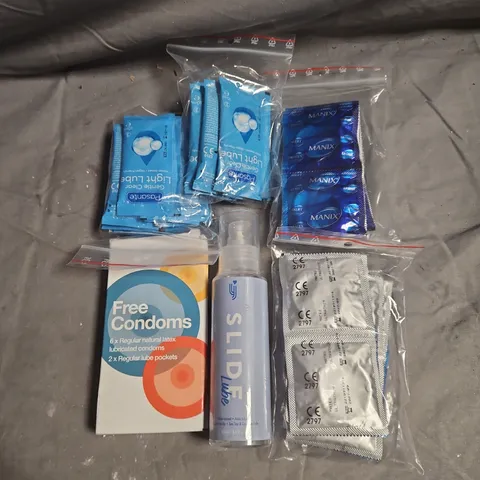TOTE OF APPROXIMATELY 20 ASSORTED CONDOMS & LUBRICANTS