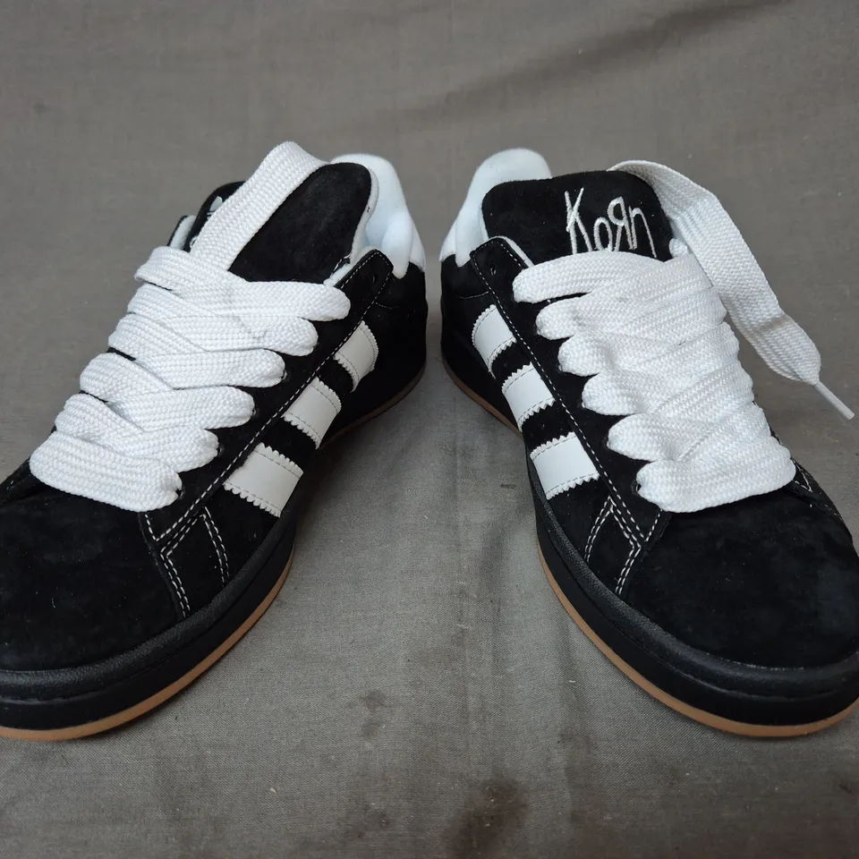 BOXED PAIR OF ADIDAS CAMPUS 00S KORN EDITION SHOES IN BLACK/WHITE UK SIZE 5