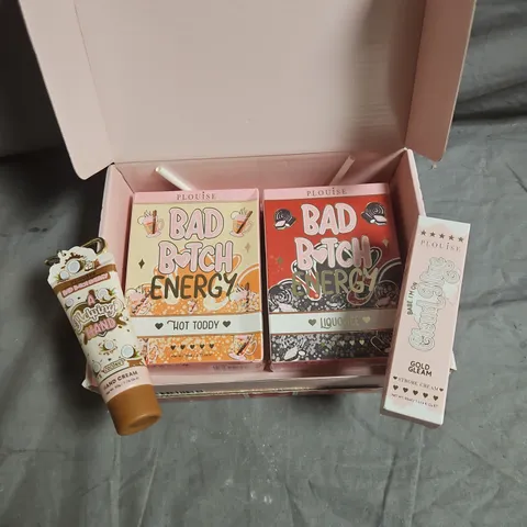 PLOUISE LOT OF 4 ASSORTED COSMETIC PRODUCTS TO INCLUDE - BAD B*TCH ENERGY LIP KIT - CLOUD NINE STROBE CREAM - COCONUT HAND CREAM - ETC