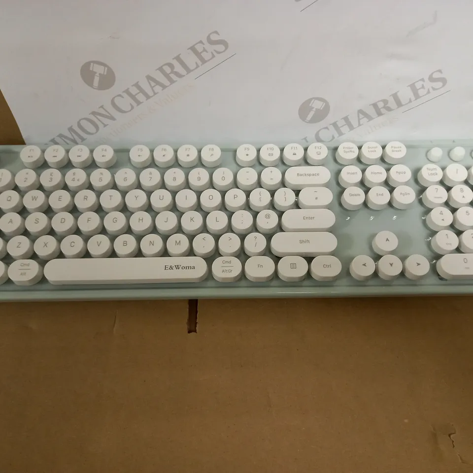E & WOMA WIRELESS KEYBOARD