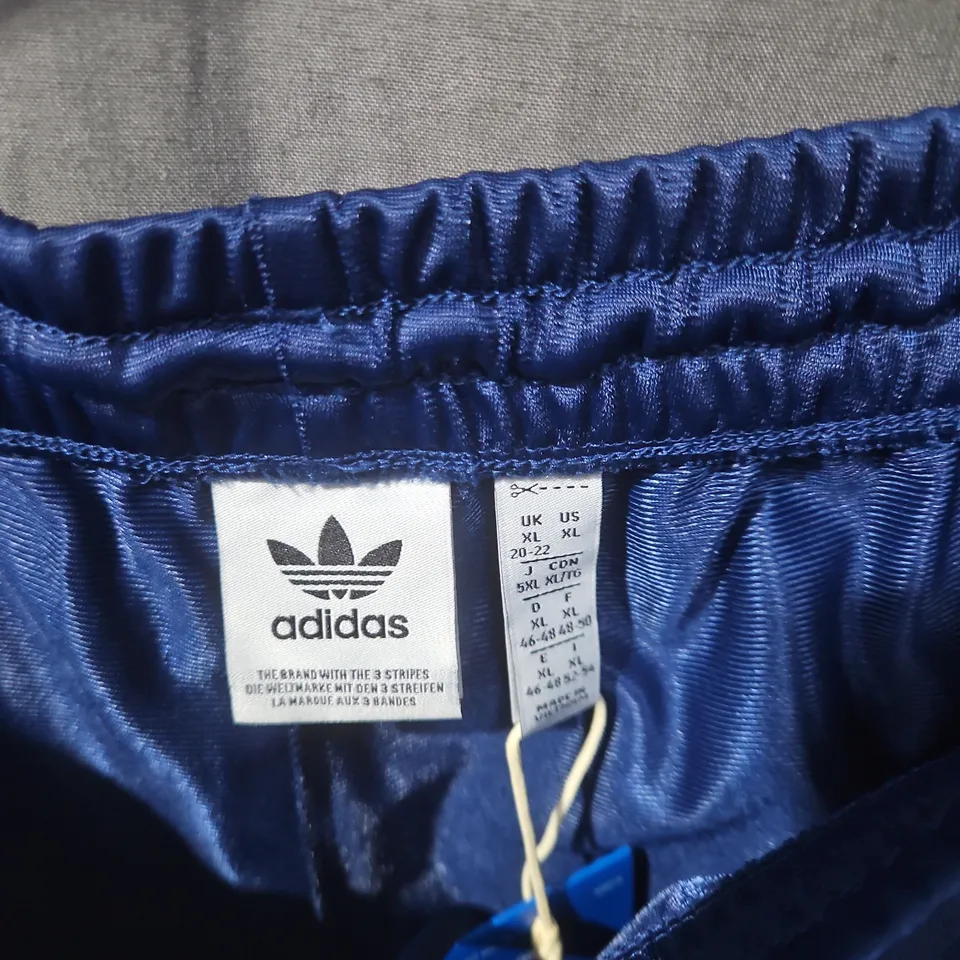 ADIDAS NAVY TRACK PANTS WITH WHITE STRIPES – UK XL 