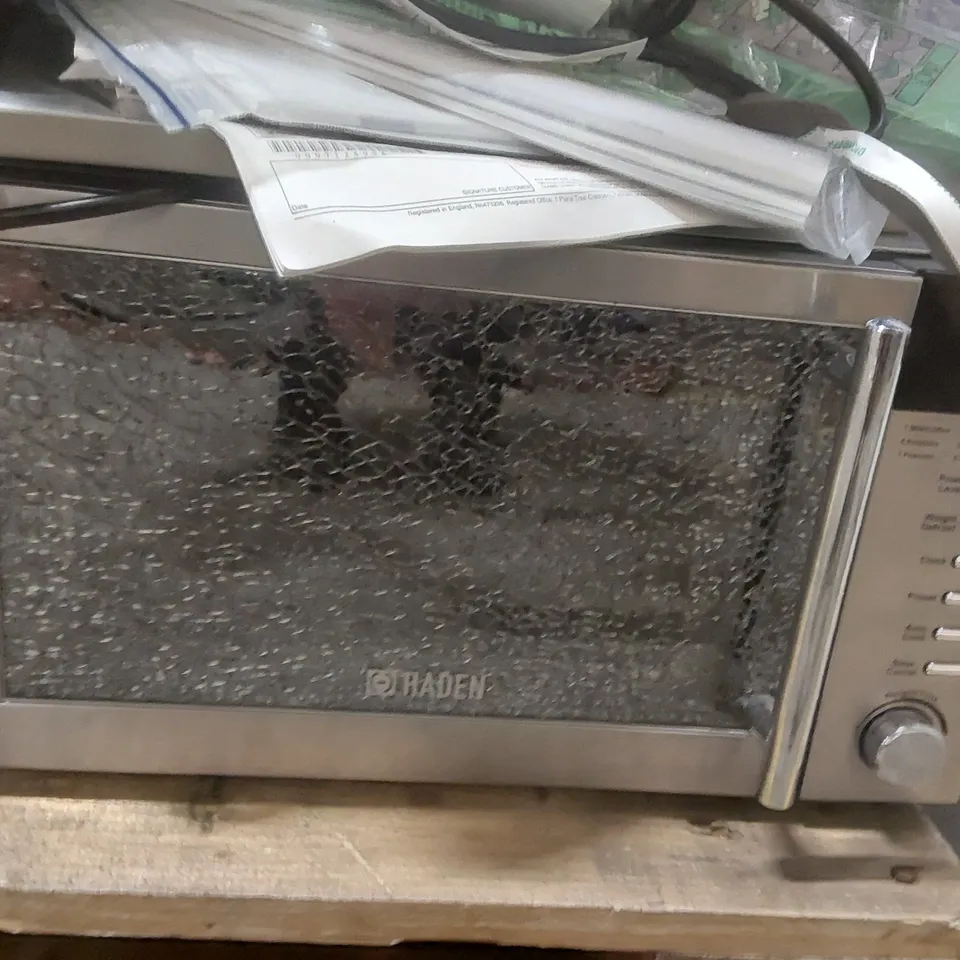 PALLET CONTAINING A VERY LARGE QUANTITY OF ASSORTED CATERING EQUIPMENT PARTS INCLUDING HADEN MICROWAVE WITH DAMAGED
FRONT, TOASTER, KETTLES ECT